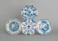 Four Delft blue and white plates