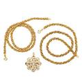 Two gold rope necklaces  diamond scroll brooch