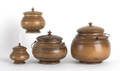 Rare graduated set of turned maple peaseware lidded canisters 19th c