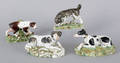 Four Staffordshire pearlware hounds early 19th c