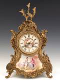 French ormolu and porcelain mantle clock retailed by JE Caldwell  Co