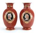 Pair of porcelain vases with hand painted classical busts