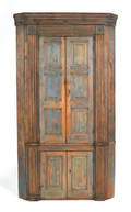 Mid Atlantic painted hard pine onepiece corner cupboard ca 1800