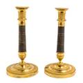 A Pair of Empire Gilt and Patinated Bronze Candlesticks