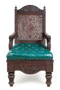 An AngloIndian Carved Armchair
