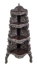 An AngloIndian Carved Hardwood Corner Etagere