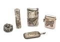 A Collection of Four Silver and SilverPlate Articles
