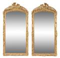 A Pair of Rococo Style Giltwood Pier Mirrors