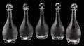 A Set of Five Baccarat Etched Glass Decanters