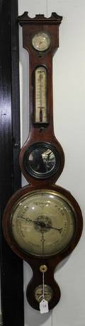 An English Mahogany Wheel Barometer