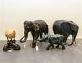 A Group of Four Cast Metal Elephant Figures