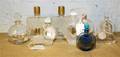A Collection of Ten Lalique Glass Perfume Bottles