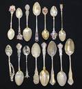 A Collection of Fifteen Silver Souvenir Spoons