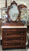 A Victorian Mahogany Dresser with Mirror