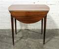 An English Mahogany Drop Leaf Table