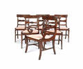 Set of six classical style mahogany saber leg dining chairs