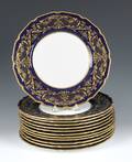 Set of twelve Royal Doulton porcelain plates with cobalt border and gilt decoration