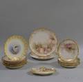 Fifteen Limoges Porcelain Fish and Shell Plates and Dishes