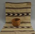 Hualapai Storage Basket and a Navajo Rug