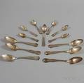 Thirteen Monogrammed Coin Silver Tablespoons and Teaspoons