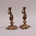 Pair of Patinated Bronze Figural Candlesticks