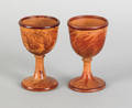 Two treenware egg cups 19th c