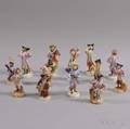 Thirteen Continental Porcelain Monkey Band Figures