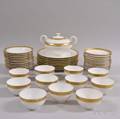 Approximately Sixtyfour Pieces of Giltrimmed Porcelain Tableware