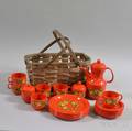 Set of West German Floraldecorated Red Plastic Tableware and a Basket