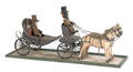 American carving of Abraham Lincoln in a horse drawn carriage late 19thearly 20th c