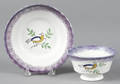 Purple spatter dove cup and saucer 19th c