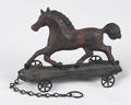 American painted tin horse platform pull toy