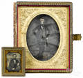 Full plate daguerreotype of a gentleman in a bookform case with motherofpearl ornamentation