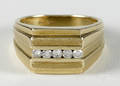 Gold and diamond ring with a 14K yellow gold band with a row of five full cut diamonds