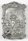 Heavily embossed sterling silver match vesta safe with nude woman emerging from a seashell in the water and cherubs in the background sky