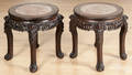 Pair of Chinese carved hardwood marble top stands