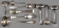 Assorted silver serving spoons and ladles