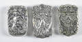 Three heavily embossed silveroin match vesta safes