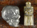 Two figural match vesta safes