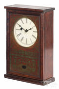 Mahogany mantel clock with an glomis door
