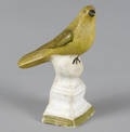 Pennsylvania painted chalkware song bird on a pedestal 19th c