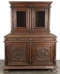 Renaissance style carved walnut twopart cupboard