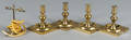 Four English brass candlesticks