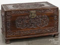 Chinese carved camphorwood blanket chest on frame