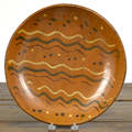 Pennsylvania redware charger 19th c