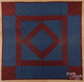 Amish diamond in block quilt