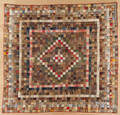 Pieced postage stamp diamond in square quilt