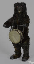 Clockwork drumming bear