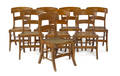 Set of eight tiger maple saber leg dining chairs ca 1835