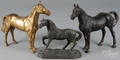 Three metal horse figures